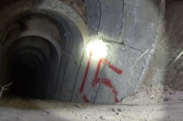 A still from bodycam footage inside a tunnel in an undisclosed location released by the Israeli Defence Forces on November 8.