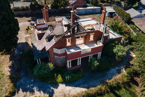 The Ivanhoe RSL, pictured this week, still in ruins after a 2017 fire.