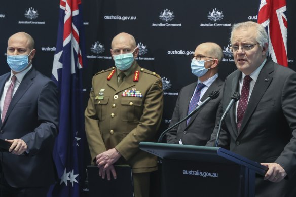 Treasurer Josh Frydenberg, COVID-19 Taskforce Commander Lieutenant-General John Frewen, Chief Medical Officer Professor Paul Kelly and Prime Minister Scott Morrison.