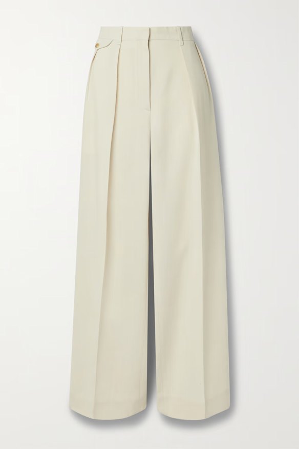 A typical working day for Roman sees her wearing high-waisted pants from The Row.