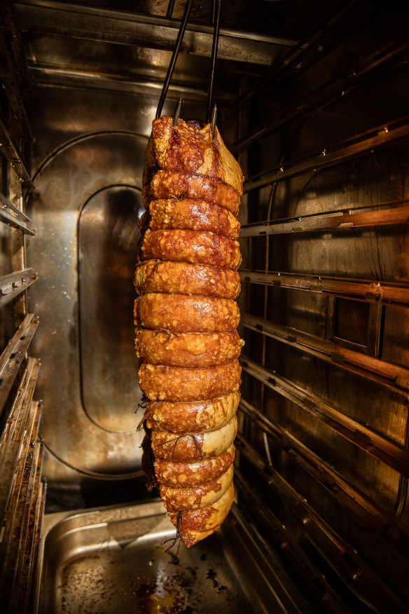 The golden, crackling porchetta being prepared for the Sunday roast at Woolwich Pier Hotel