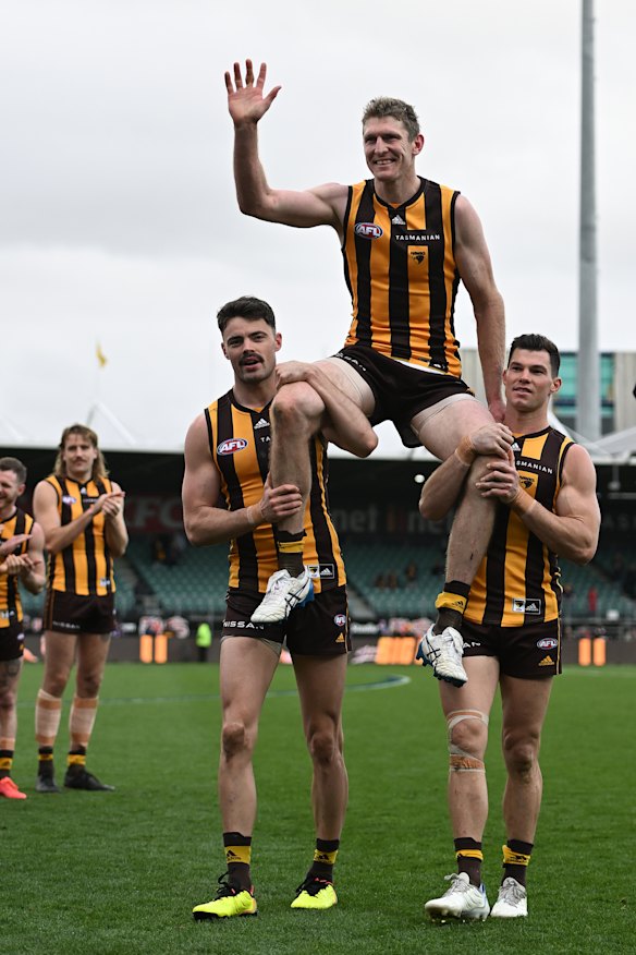 Hawks star Ben McEvoy is chaired from the field after his last game.
