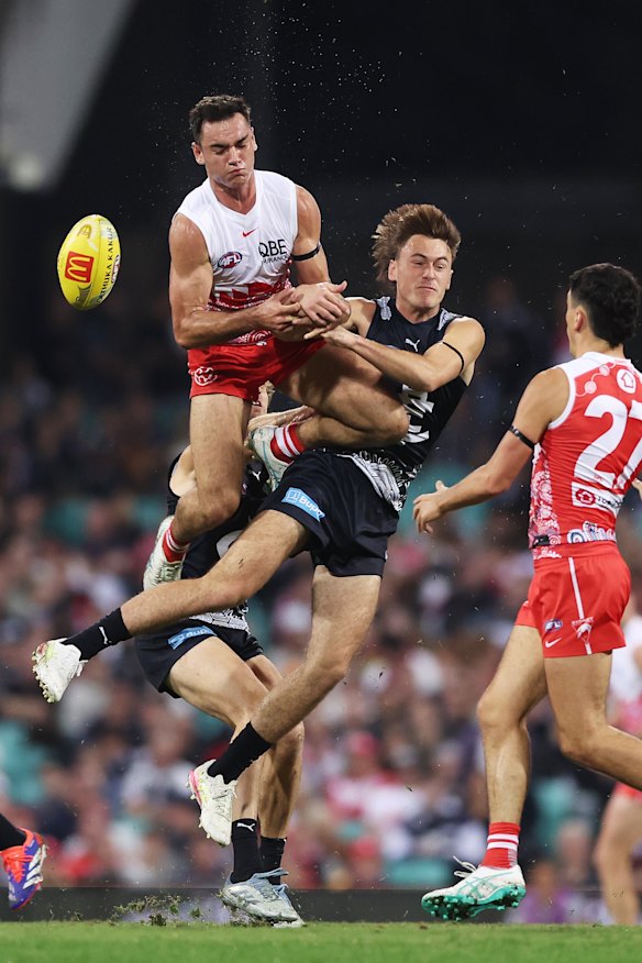 Matt Carroll in action against the Swans.