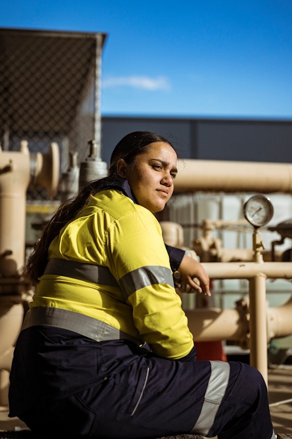 Apprentice plumber Kilani Brophy says living with her dad helps with bills.