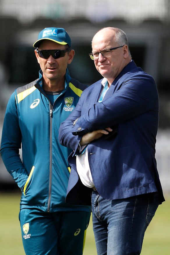 Justin Langer with Cricket Australia chairman Earl Eddings (right).