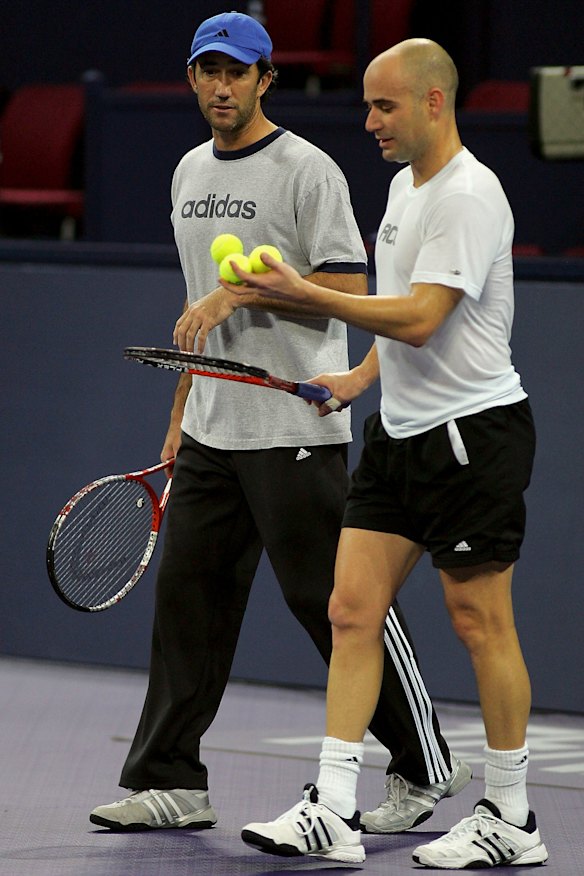 With Andre Agassi in 2005. “Darren lives with such a beautiful balance between his head and his heart,” Agassi says.