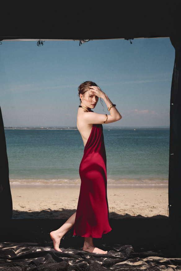 Dress and jewellery by Gucci.