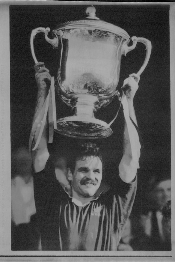 Gary Whetton lifts the Bledisloe Cup in 1991.