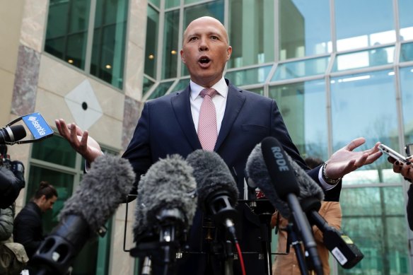 Peter Dutton addresses the media at Parliament House on August 21.