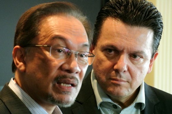 Malaysian opposition leader Anwar Ibrahim, left, with senator Nick Xenophon in Jakarta in 2014.