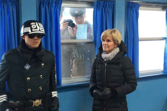 Foreign Minister Julie Bishop is photographed by North Korean soldiers during a trip to the demilitarised zone.
