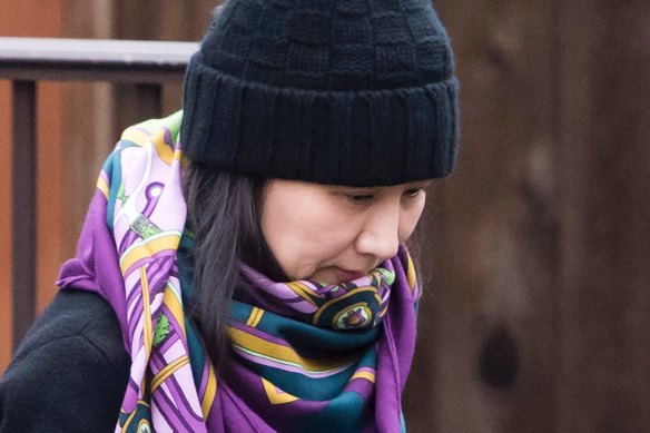 Former Huawei Australia director Meng Wanzhou leaves her home in Canada.