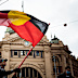 An Invasion Day protester seen in Melbourne in 2021.