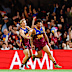 Cam Rayner of the Lions celebrates a goal.