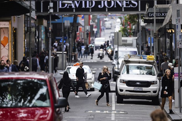 Pedestrians on Little Bourke Street in Melbourne