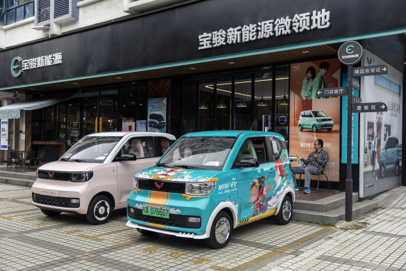 SAIC-GM-Wuling Automobile’s Hongguang Mini electric vehicles outside a dealership in Liuzhou.