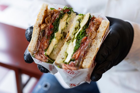 The prosciutto panino is filled with San Daniele prosciutto, Floridia Cheese fior di latte, rocket and housemade basil pesto.