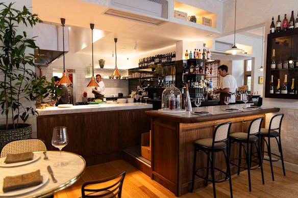 Linger at the bar with some oysters as you wait for a table. 