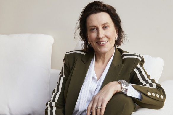 Virginia Trioli wears Trelise Cooper suit, Trenery shirt, Roxanne Assoulin earrings. Rings and watch Trioli’s own.