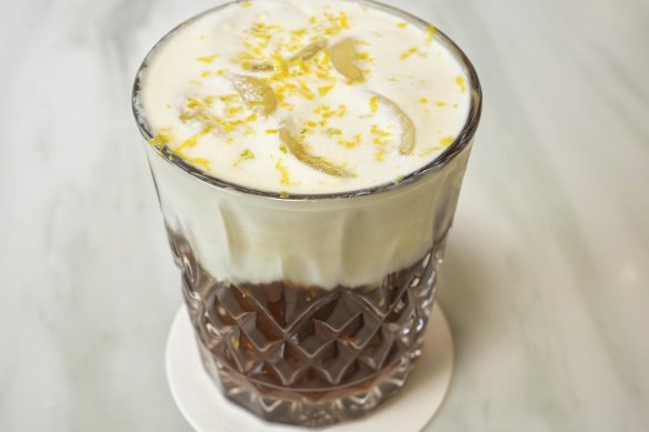 The signature “Citrusy Moustache” (cold brew coffee topped with orange-infused whipped cream).