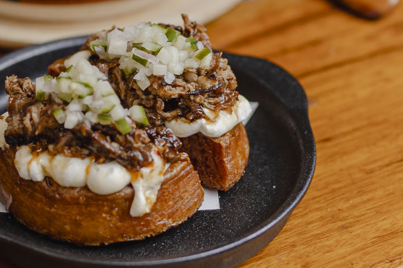 Crumpet topped with XO lamb, yuzu labneh and hot honey.