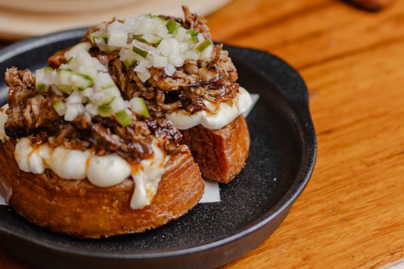 Fried crumpet topped with XO lamb, yuzu labne and hot honey.