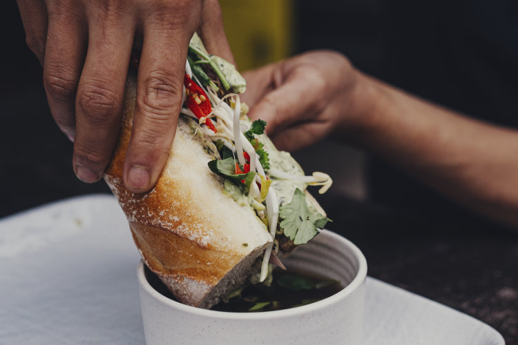 Lit Canteen’s juicy pho-mi sandwich with slow-cooked brisket.