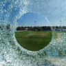 HOVE, ENGLAND - SEPTEMBER 09:  Sussex take on Northamptonshire viewed through the press box window, smashed by a Mal Loye six during the LV County Championship match between Sussex and Northamptonshire at the County Ground on September 9, 2010 in Hove, England. Journalists present report no injuries.  (Photo by Mike Hewitt/Getty Images) HOVE, ENGLAND - SEPTEMBER 09: Sussex take on Northamptonshire viewed through the press box window, smashed by a Mal Loye six during the LV County Championship match between Sussex and Northamptonshire at the County Ground on September 9, 2010 in Hove, England. Journalists present report no injuries. (Photo by Mike Hewitt/Getty Images)
