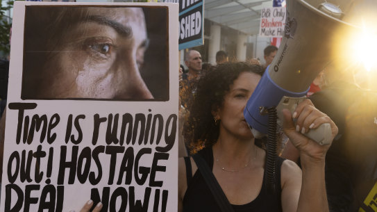 Families of hostages demonstrate outside a press event by US Secretary of State Antony Blinken in Tel Aviv, Israel. 