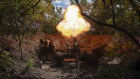 Soldiers fire a heavy mortar at Russian forces on the front line near the city of Bakhmut in Ukraine’s Donetsk region.