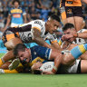 Jarrod Wallace scores for the Titans against the Broncos at Cbus Super Stadium in their round 2 match in 2021.