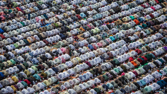 Muslims perform Eid al-Fitr prayers in a public playground in Bengaluru, India. Muslims worldwide observe the Eid Al-Fitr prayer to mark the end of Ramadan.