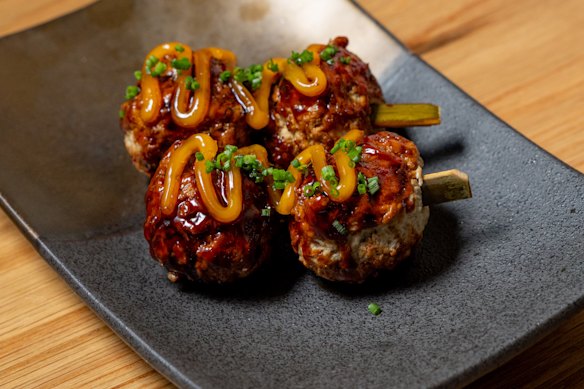 Chicken tsukune skewers.