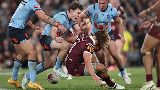 Liam Martin smashes Reuben Cotter.