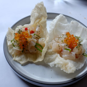  Kingfish tartare with nori rice crisp.