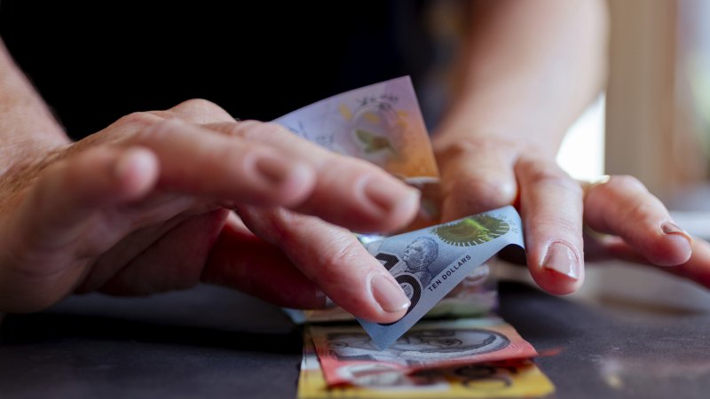 Why anxious Australians are putting cash back in their wallets