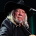 Country music legend John Anderson has died at 71, his family confirming he died peacefully in his sleep. 