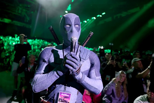 Ryan Reynolds in Deadpool cosplay speaks from the audience during the Marvel Studios Panel at 2026 San Diego Comic-Con on July 25, 2026 in San Diego, California. 