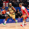 Patty Mills drives to the basket against Georgia.