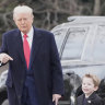 President Donald Trump walks with Elon Musk’s son X Æ A-Xii on the South Lawn of the White House, Friday, March 14, 2025, in Washington to depart on Marine One. (AP Photo/Alex Brandon)