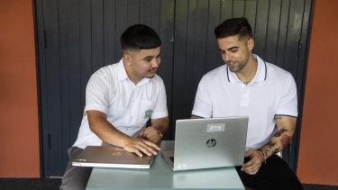 South Strathfield High student Nek Sultan (left) with his careers advisor Paris Hadjisocratous (right).