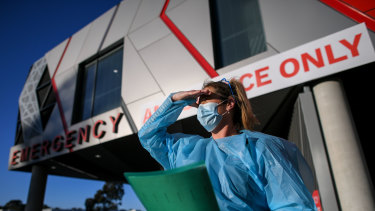 Nurse Tamie Adams outside the Austin Hospital on Friday.