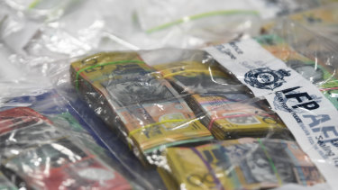 Seized drugs and money are displayed at the Australian Federal Police headquarters in Melbourne on Wednesday.