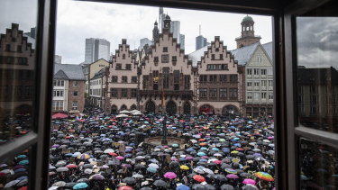 People gather in Frankfurt.