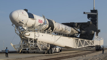 The SpaceX Falcon 9 rocket with the company’s Crew Dragon spacecraft is rolled to Launch Complex before take off. 