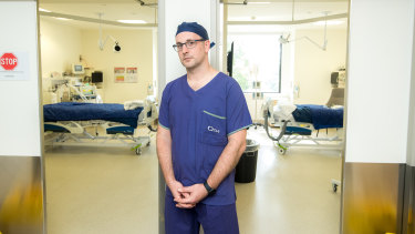 Associate Professor David Brewster, intensive care deputy director, outside two of the new intensive care rooms at  Cabrini hospital.