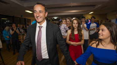 Dave Sharma and his family as results came in on Saturday night. 