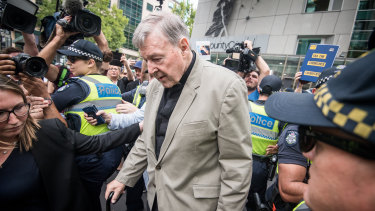 Cardinal George Pell leaving the County Court in Melbourne.