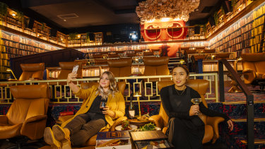 Allie Athanasio with Alisha Thornley, in the new Boutique 'Library' cinema, expected to be popular with the "selfie set".