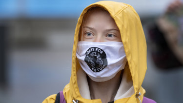 Swedish climate activist Greta Thunberg attends a Fridays For Future protest outside the Swedish Parliament in Stockholm in October.